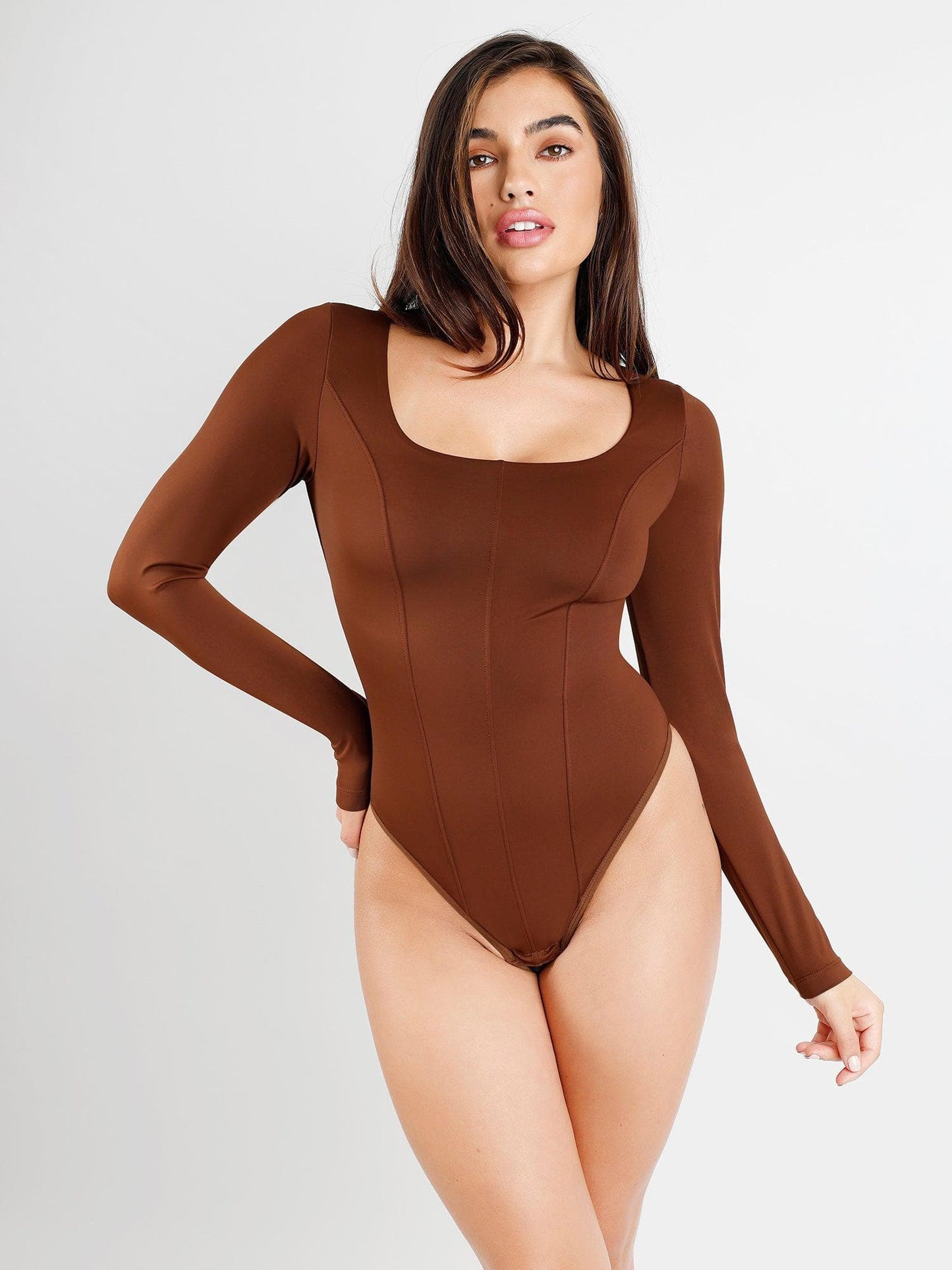 Shaping bodysuit with long sleeves and shaping thong